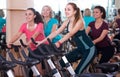 Elderly and young women working out hard in sport club Royalty Free Stock Photo