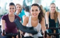 Elderly and young women working out hard in sport club Royalty Free Stock Photo