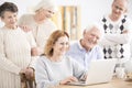 Elders smiling at laptop Royalty Free Stock Photo