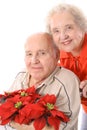 Eldery couple with flowers vertical Royalty Free Stock Photo