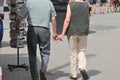 ELDLERY COUPLE HLDING HANDS IN ARCELONA SPAIN Royalty Free Stock Photo