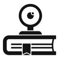 Black and white icon of a webcam mounted on an open book, symbolizing online education Royalty Free Stock Photo