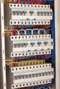 Electical distribution fuseboard. Electrical supplies. Electrical panel at a assembly line factory. Controls and switches.