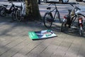 Election billboard of the right wing party leefbaar rotterdam with leader Joost Eerdman fallen on the street