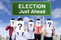 Election board and unknown people Royalty Free Stock Photo