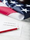 Election campaign. Vote for Democrats and Republicans. parliamentary elections. American flag and piece of paper, red pencil. Royalty Free Stock Photo