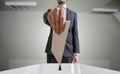 Election and democracy concept. Voter holds envelope or paper in hand above ballot Royalty Free Stock Photo
