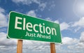 Election Just Ahead Green Road Sign Over Clouds and Blue Sky Royalty Free Stock Photo