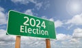 2024 Election Just Ahead Green Road Sign Over Clouds and Blue Sky Royalty Free Stock Photo