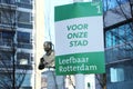 Election sign of the Leefbaar party and statue of the murdered founder of that party Pim Fortuyn in Rotterdam the Netherlands.