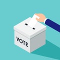 Election and voting concept. Businessman putting a ballot in a ballot box Royalty Free Stock Photo