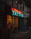 Electric Anvil Tattoo and Piercing neon sign at night, Crown Heights, Brooklyn, New York