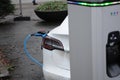 Electric autos rechagre at E-on charge point in Copenhagen