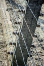 Electric barbed wires of German nazi concentration and extermination camp Royalty Free Stock Photo