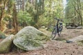 Electric bicycle on the bicycle tour in the forest in the heath landscape in Northern Germany with a rustic seating area with