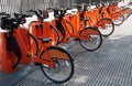 Electric bicycles parked at a bike sharing station Royalty Free Stock Photo