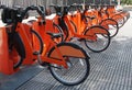 Electric bicycles parked at a bike sharing station Royalty Free Stock Photo