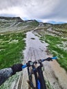 Electric bike at mountain during hail day snow Royalty Free Stock Photo