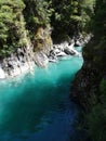 Electric blue water Makarora River in New Zealand