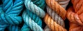 Electric blue, woolen thread, and fleshcolored fiber ropes stack Royalty Free Stock Photo