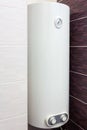 Electric Boiler wall water heater in bathroom.