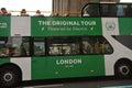 Electric bus for tourists touring the center of London city , England Royalty Free Stock Photo