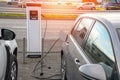 Electric car being charged at a charging station Royalty Free Stock Photo