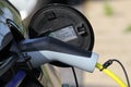 Electric car being charged Royalty Free Stock Photo