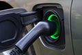 Electric car and charging at charging station closeup Royalty Free Stock Photo