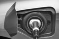 Electric car charging detail. Green and renewable energy technology Royalty Free Stock Photo