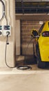 Electric car charging in home garage Royalty Free Stock Photo