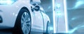 The electric car charging at a modern station showcasing innovative technology. AI generated image Royalty Free Stock Photo