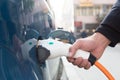 Electric Car in Charging Station. Royalty Free Stock Photo