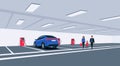 Electric Car Charging at Underground Garage on Parking Lot with Wall Box Charger Royalty Free Stock Photo