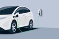 Electric Car Charging at Underground Garage on with Wall Box Charger Station Royalty Free Stock Photo