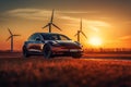 Electric Car in field with Wind turbines. EV electric car in Eolic park windpower.