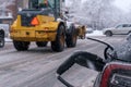 Electric car getting charged in Montreal during snowstorm Royalty Free Stock Photo