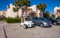 Electric car in the hotel parking in Egypt. Modern ecological transport Royalty Free Stock Photo