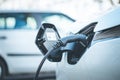 Electric car is refueling up its batteries, future innovation of mobility Royalty Free Stock Photo