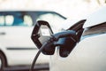 Electric car is refueling up its batteries, future innovation of mobility Royalty Free Stock Photo