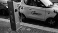 Electric car Share `N Go recharges to an Enel tower in a neighborhood of Rome