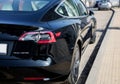 electric car Tesla parked on street Royalty Free Stock Photo