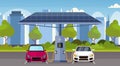 Electric cars charging on electrical charge station with solar panels renewable eco friendly transport environment care Royalty Free Stock Photo