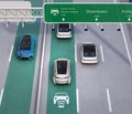 Electric cars driving on the wireless charging lane of the highway