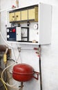 Electric central heating boiler with water heater hot circulation pump and expansion kit in house boiler room. Electric boiler