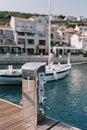 Electric charging station on the pier of a luxury marina Royalty Free Stock Photo