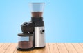 Electric coffee grinder on the wooden table, 3D rendering