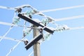 Electric communications wires covered with ice and snow. Snow-covered power cable lines and pole. Power electric transmission line Royalty Free Stock Photo