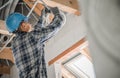 Electric Contractor Worker Installing Ceiling Light Point Royalty Free Stock Photo