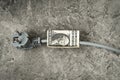 Electric cord with a dollar banknote